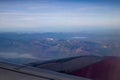 View of the mountains from the plane window Royalty Free Stock Photo