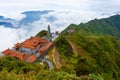 View of mountains and the temple from the Fansipan peak, Sapa, Vietnam