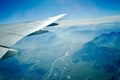 View of mountains and valley from airplane window