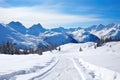 view of mountaintops from top of backcountry skiing route