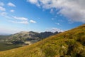 View on mountais in summer and blue sky with clouds