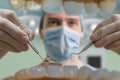 View from mouth on dentist with dental instruments Royalty Free Stock Photo