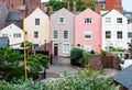 Multi coloured terraced houses in residential district.