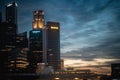 View of multi-purpose skyscrapers under the cloudy sunset sky in Singapore