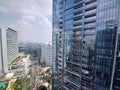 View of a multi-storey building in SCBD Sudirman as seen from the top of an office building,