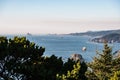 View of multiple Islets that stand out in the Pacific Ocean amid the haze in Southern Oregon, USA Royalty Free Stock Photo