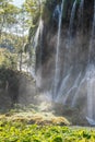 Waterfalls from rocky cliff in forest at plitvice lakes national park croatia Royalty Free Stock Photo