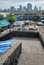 View of Mumbai skyline over slums in Bandra suburb