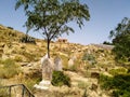 View of a Muslim graveyard typical of North African countries with a local marabout Muslim saint grave house shrine built in the m Royalty Free Stock Photo