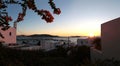 View of Mykonos, windmill and old port from a house at sunset Royalty Free Stock Photo