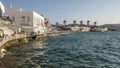 The view of the mykonos windmills from a little venice cafe on mykonos