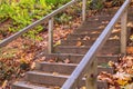 View at n empty stairs made large wooden beams put together on a steep slope of a hill.