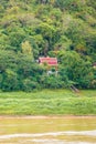 View of the Nam Khan river, Louangphabang, Laos. Copy space for text. Vertical. Royalty Free Stock Photo