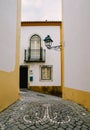 View of narrow paved street in Constancia, Portugal