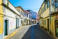 View of a narrow street in Cacilhas, Portugal