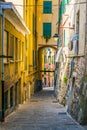 view of a narrow street in the historical center of the italian city genoa....IMAGE Royalty Free Stock Photo