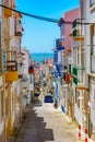 View of a narrow street in Nazare, Portugal