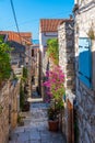 View of a narrow street in the old town of Hvar, Croatia Royalty Free Stock Photo