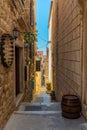 View of a narrow street in the old town of Hvar, Croatia Royalty Free Stock Photo