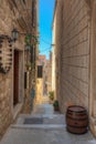 View of a narrow street in the old town of Hvar, Croatia Royalty Free Stock Photo