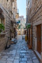 View of a narrow street in the old town of Hvar, Croatia Royalty Free Stock Photo