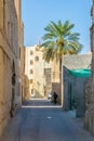 View of a narrow street of the old town of Nizwa, Oman....IMAGE