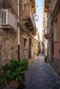 View of narrow street in Syracuse, Italy