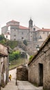 View of a narrow street to Convent de Santa Maria de Belvis monastery in Santiago de Compostela Royalty Free Stock Photo