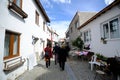 View of narrow street, traditional, old historical houses in famous, touristic Aegean town called `Sigacik`