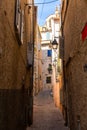 Narrow streets in French town of Hyeres in summer day