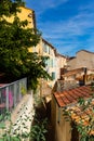 Narrow streets in French town of Hyeres in summer day