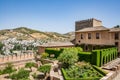 View of the Nasrid Palaces Palacios NazarÃÂ­es and gardens in front of them in Alhambra