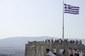 View of the national flag of Greece at the Acropolis in Athens, Greece