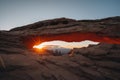 View through Natural Arch, Mesa Arch, Sunrise, Grand View Point Road, Island in the Sky, Canyonlands National Park, Moab Royalty Free Stock Photo