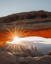 View through Natural Arch, Mesa Arch, Sunrise, Grand View Point Road, Island in the Sky, Canyonlands National Park, Moab Royalty Free Stock Photo