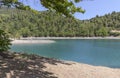 A view of the natural Lake Tsivilu Peloponnesus, Greece and mountains around on a sunny, summer day Royalty Free Stock Photo