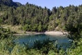 A view of the natural Lake Tsivilu Peloponnesus, Greece and mountains around on a sunny, summer day Royalty Free Stock Photo