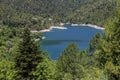 A view of the natural Lake Tsivilu Peloponnesus, Greece and mountains around on a sunny, summer day Royalty Free Stock Photo
