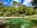 View of natural pool in the river Sentino near the famous Frasassi cave (Grotte di Frasassi)