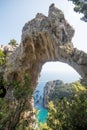 View of natural rock arch with the sea in the background Royalty Free Stock Photo