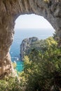 View of natural rock arch with the sea in the background Royalty Free Stock Photo