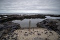 View of Natural sea pool Las Salinas de Agaete in Puerto de Las Nieves and coast cliffs. Gran Canaria, Spain Royalty Free Stock Photo