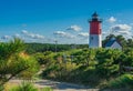 View of Nauset Lighthouse, Cape Cod, in the bushes during the day Royalty Free Stock Photo