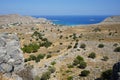 View of Navarone Bay and surrounding area in August. Lindos, Rhodes island, Greece Royalty Free Stock Photo