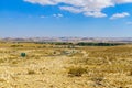 Negev Desert near Sde Boker, with trilingual road signs Royalty Free Stock Photo