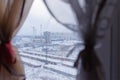 View of the neighborhood under construction and rows of garages from the apartment window in the high-rise building. Royalty Free Stock Photo