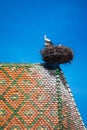 View of a nest with storks, symbol of the historic town of Colmar, also known as Little Venice, Colmar, Alsace. Royalty Free Stock Photo