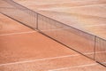 View with a net on the clay tennis court Royalty Free Stock Photo