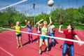 View through net on game of girls playing together Royalty Free Stock Photo