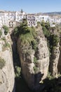 View from the new Bridge over Guadalevin River in Ronda, Malaga, Spain. Popular landmark in the evening Royalty Free Stock Photo